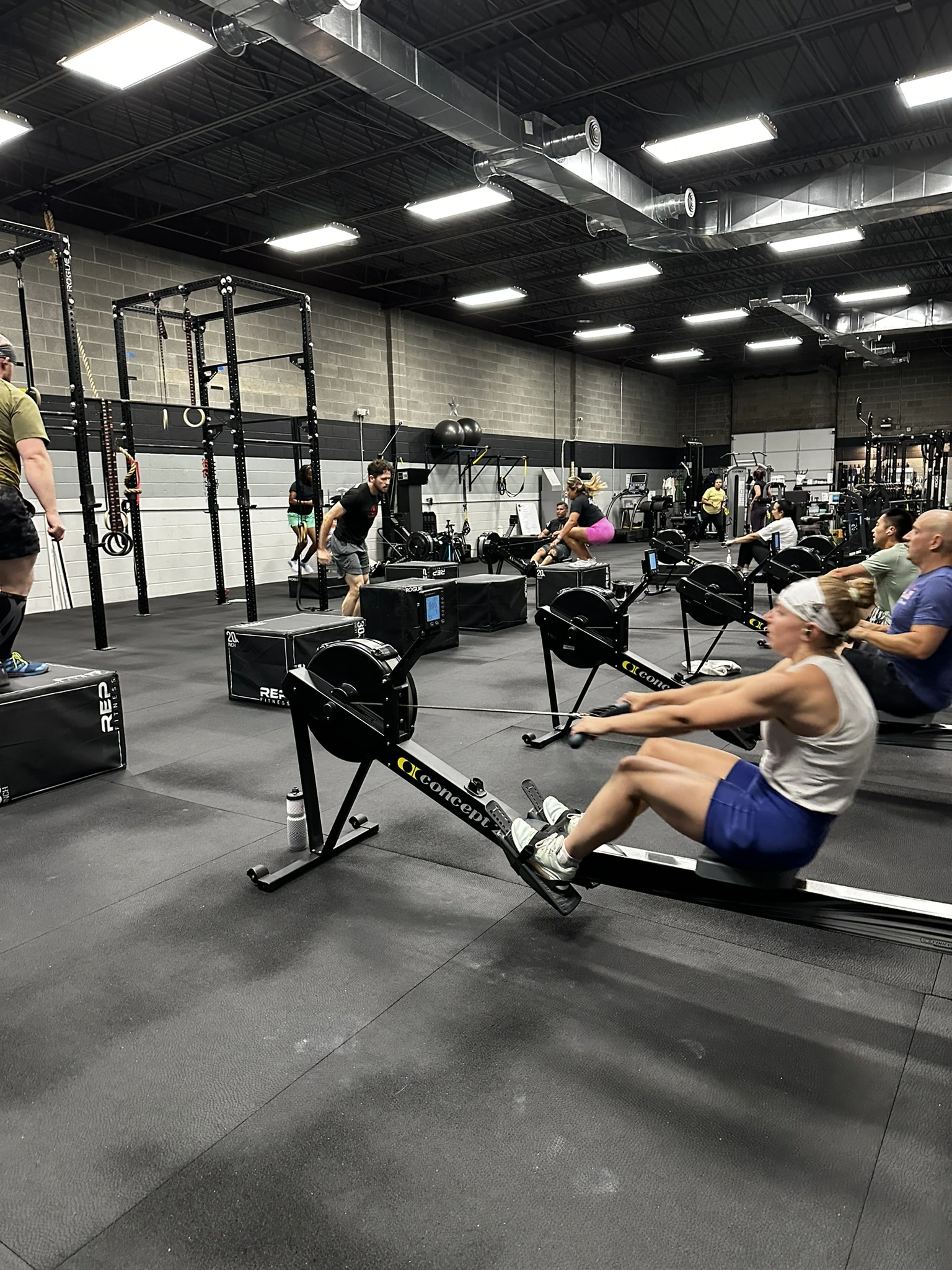 Athletes training at Sand and Steel Fitness, Alexandria’s only air-conditioned CrossFit and personal training gym featuring a premium Carrier HVAC system